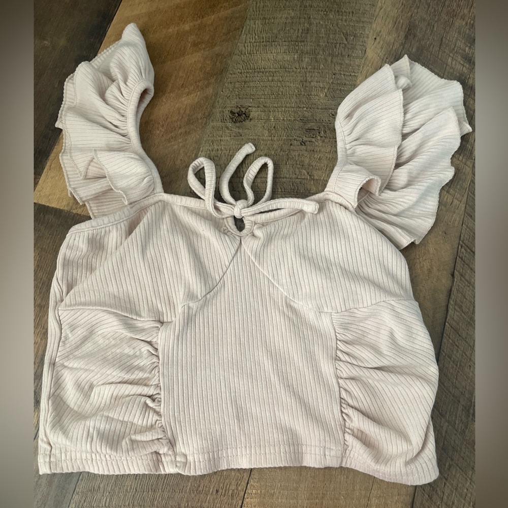 i’m selling this cute beige tilly’s blouse! Size: Small 🥯